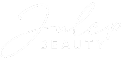 White script logo reading 'Julie' above the word 'BEAUTY' in a clean sans-serif font, shown on a solid black background.